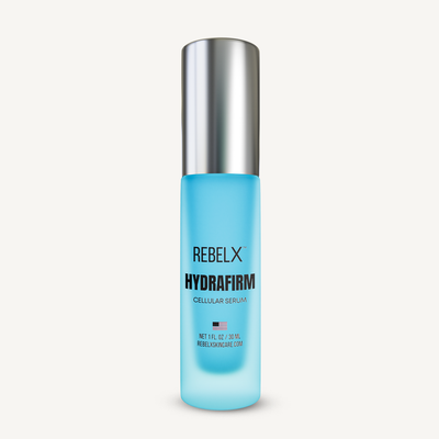 Rebel X HydraFirm Cellular Serum - pharmaceutical-grade hyaluronic acid peptide serum for mature skin in turquoise pump bottle.