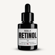 REBEL X retinol serum in black glass dropper bottle with micro-encapsulated retinol 10X formula, 1 fl oz size, made in USA for mature skin cellular renewal and anti-aging treatment